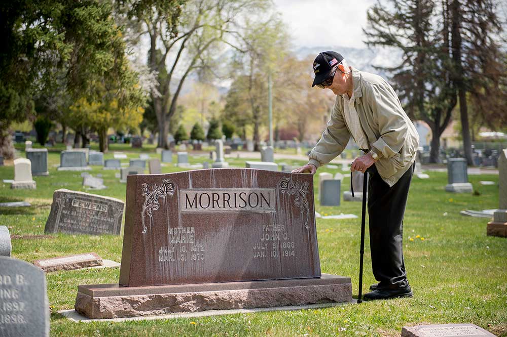 Jay Arling Morrison visits his grandparents' grave